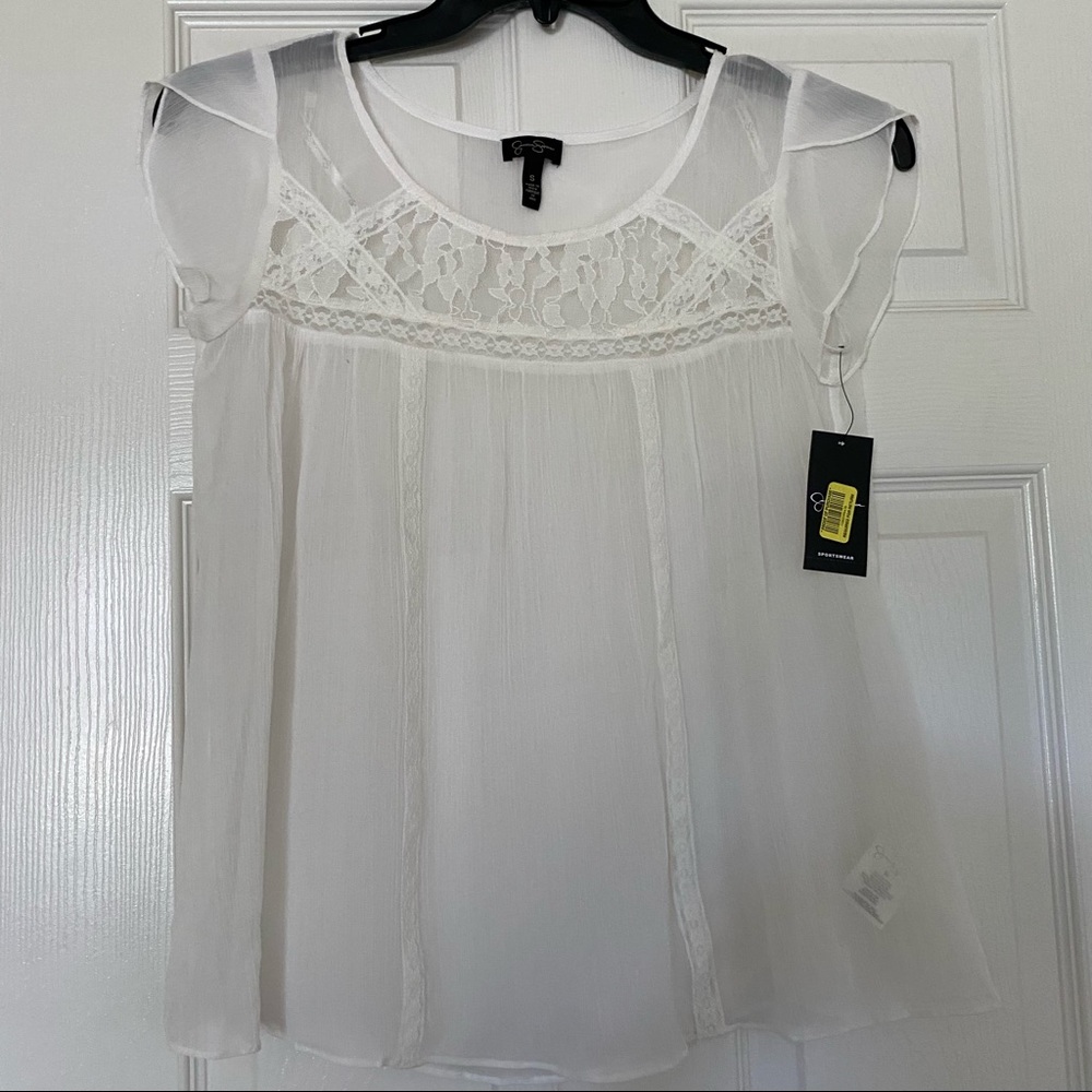 Jessica Simpson white top . Size Small